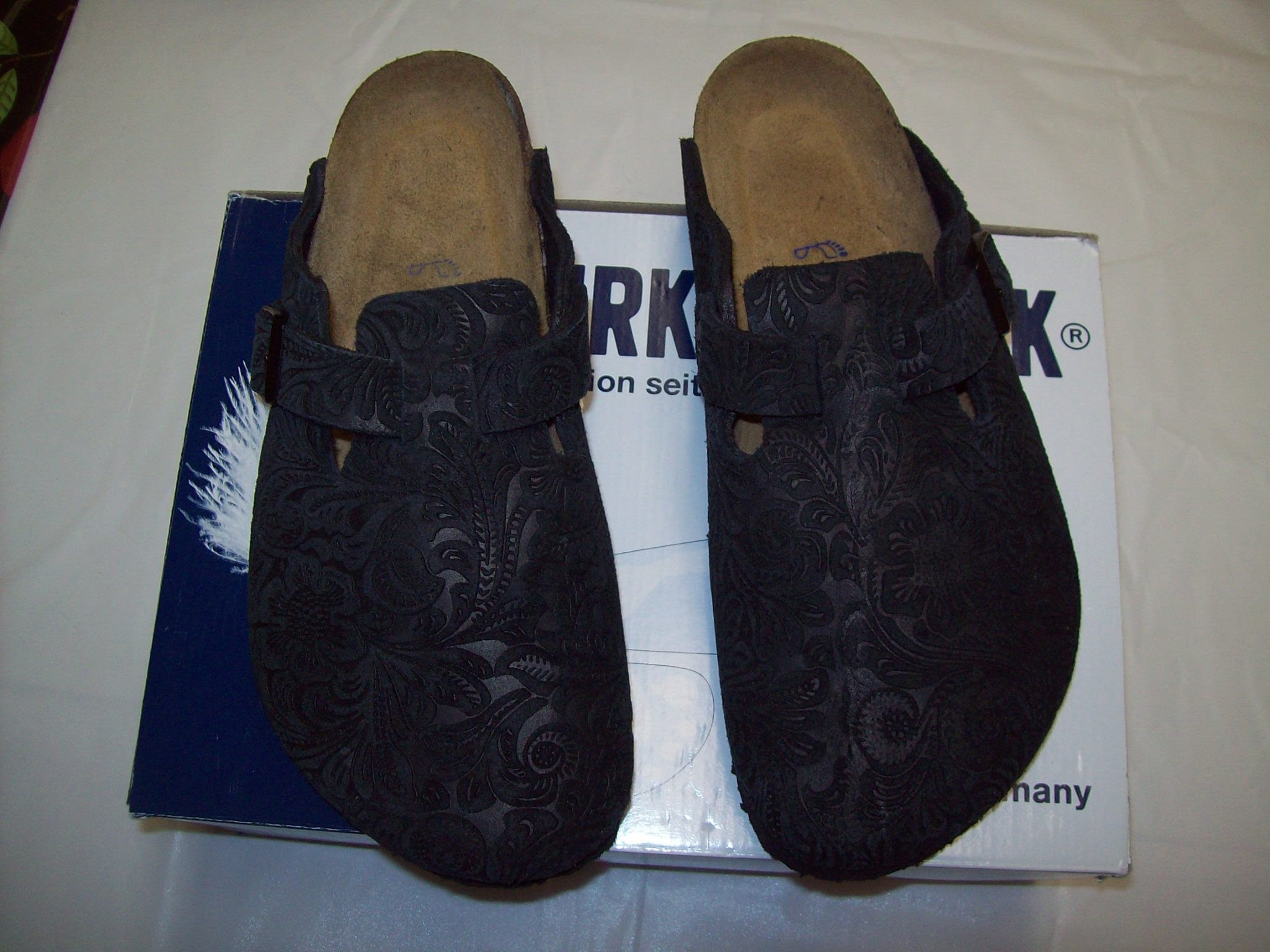 These are a 1 of 1 custom Birkenstock Boston featuring embossed